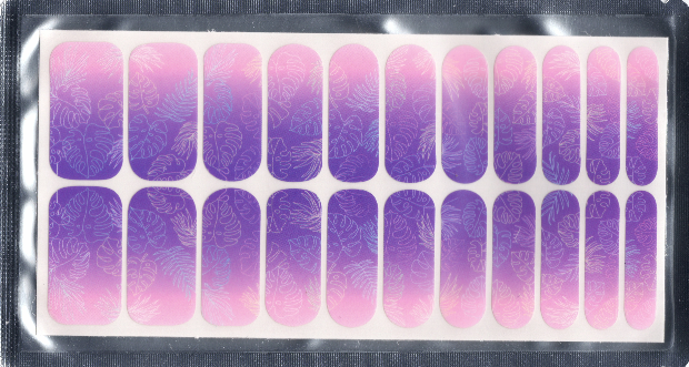 Gradient purple to pink nail art stickers on a reflective backing