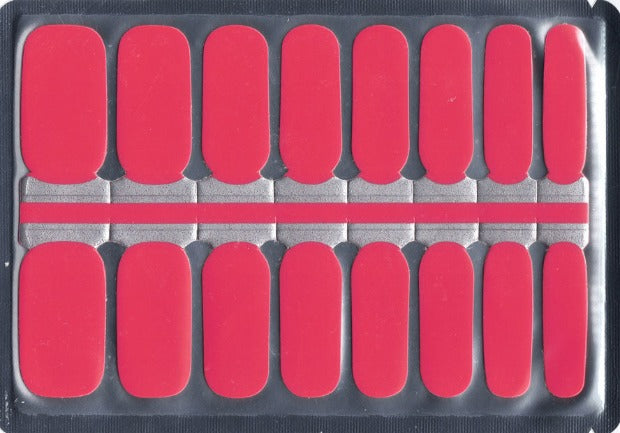 This is a product shot featuring 16 individual nail wraps laid out on a silver backing sheet, showcasing a solid, vibrant pink colour. The nail wraps are evenly spaced and uniformly shaped, demonstrating a consistent, bright pink hue across all pieces. The layout allows for a clear view of all 16 wraps, emphasizing the quantity and the bold colour of the product.