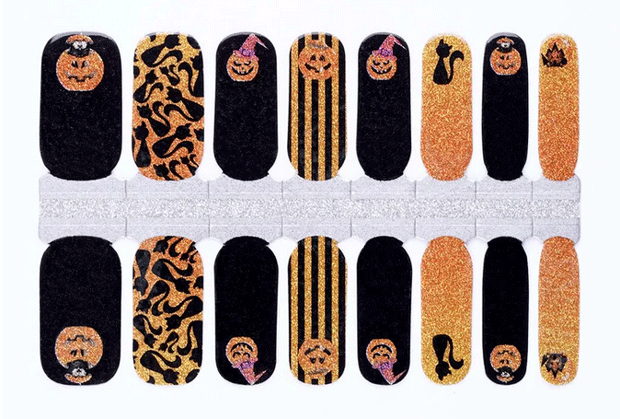 Set of Halloween-themed nail wraps with pumpkins, ghosts, and cats on a white background.