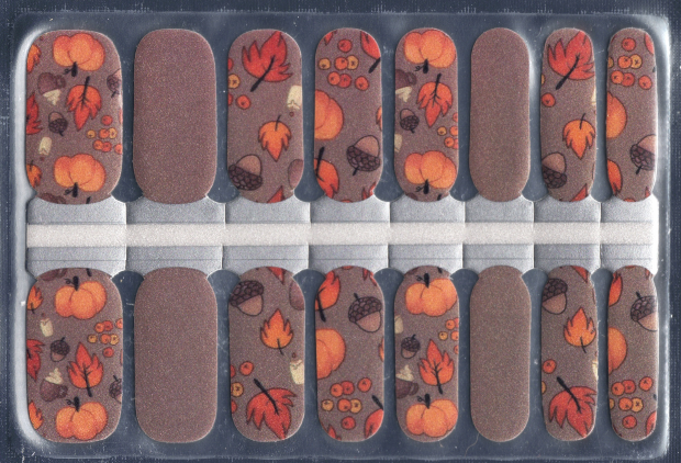 Package of 16 autumn themed nail wraps including pumpkins, acorns and falling leaves.