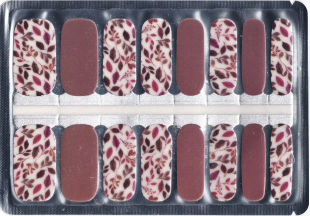 Set of 16 nail polish wraps with autumn floral and solid colours in a new package.