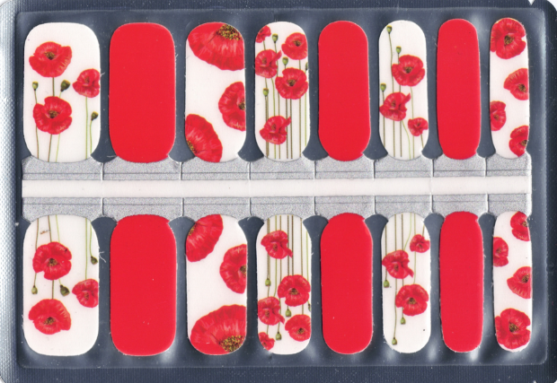A unopened package of 16 poppy themed nail polish strips